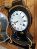 Horloge murale ancienne aux finitions noires et dorées