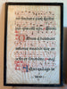 Feuille encadrée d'un antiphonaire, manuscrit enluminé en latin