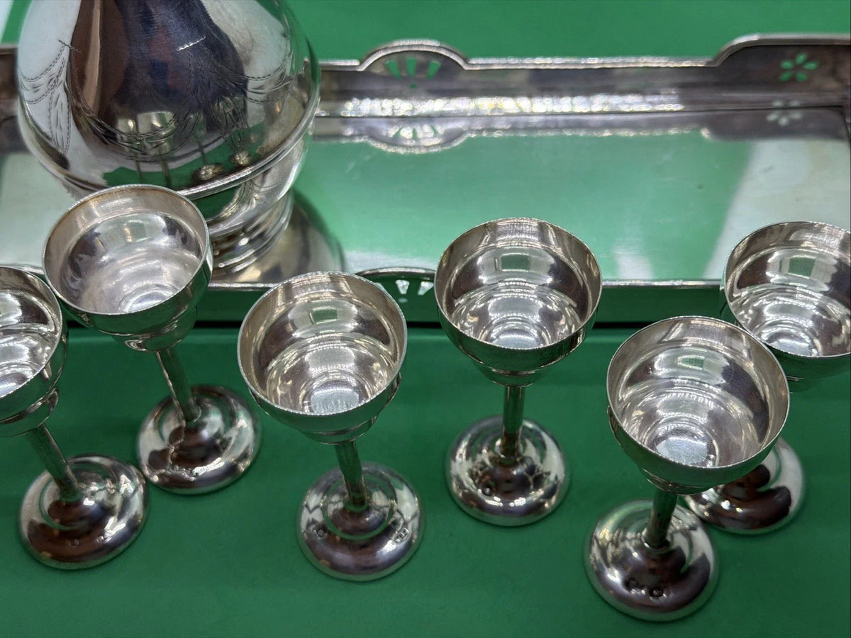 Ancien service à liqueur en argent massif