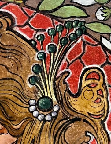 Assiette en terre cuite peinte du début du XXe siècle