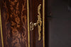 Commode antique en bois marqueté
