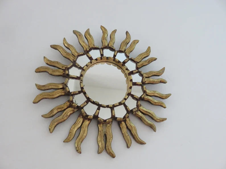 Ancien miroir soleil mural