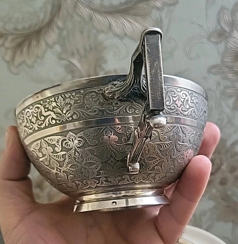 Tasse et sous tasse en argent massif