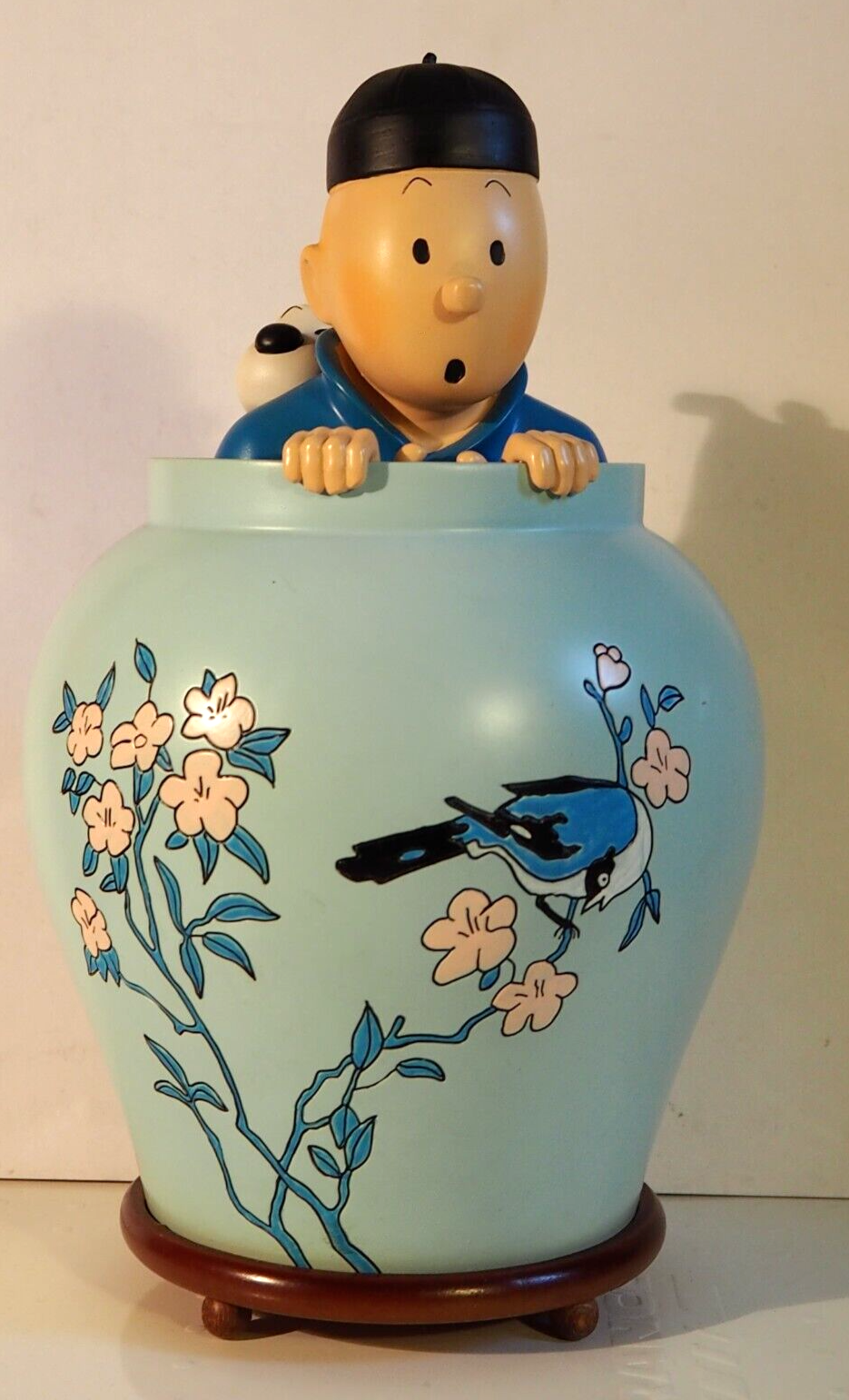 Figurine tintin dans la potiche
