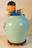 Figurine tintin dans la potiche