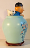 Figurine tintin dans la potiche