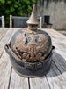 Casque à pointe modèle 1915 en cuir et métal gris