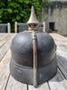 Casque à pointe modèle 1915 en cuir et métal gris