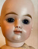 Antique petite poupée