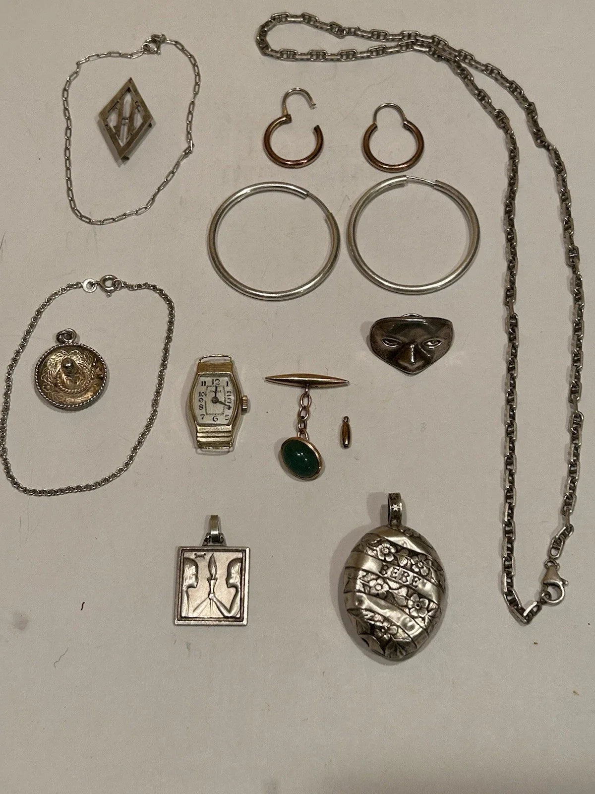 Lots de bijoux anciens en or 18 k et argent massif