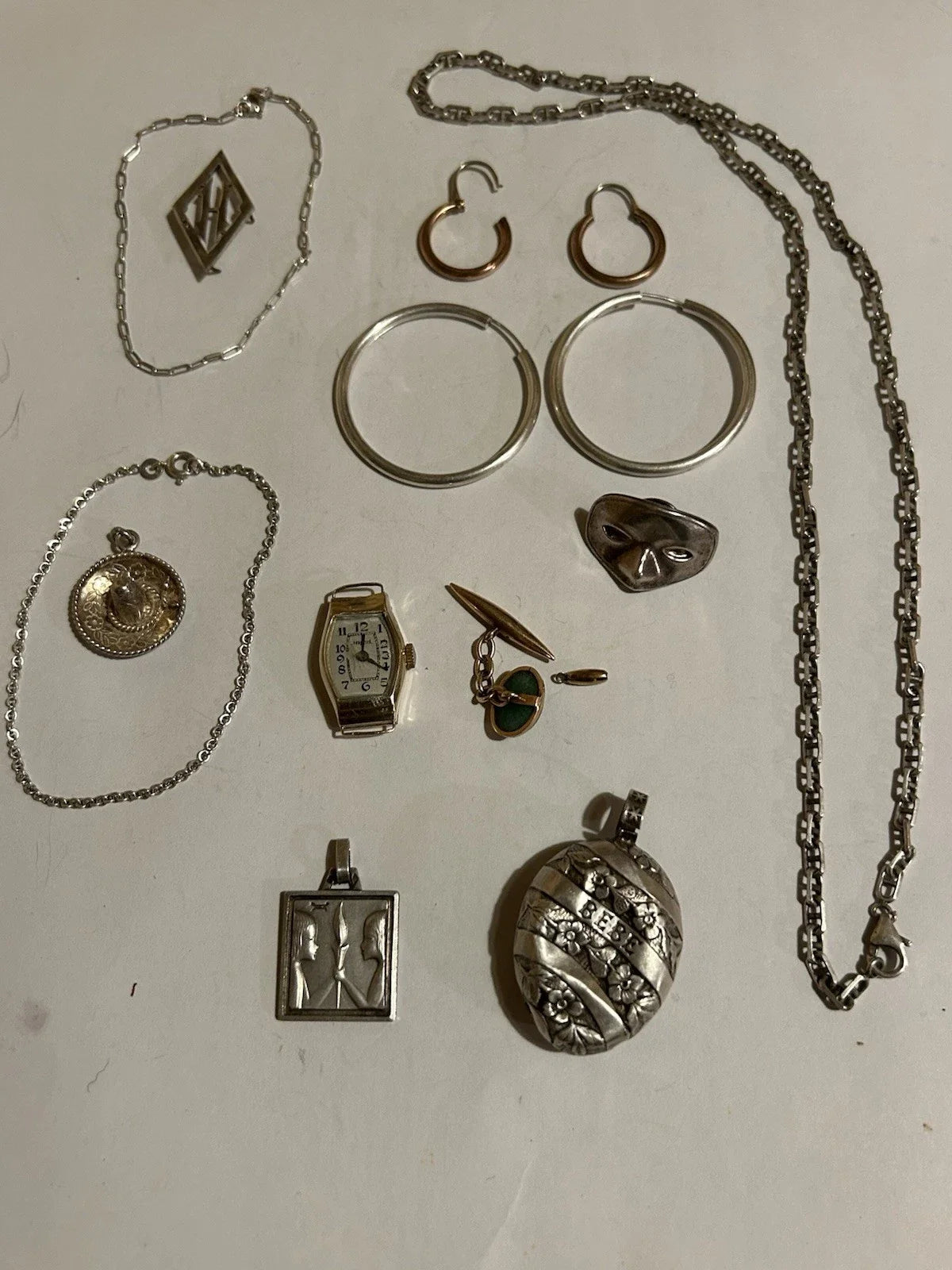 Lots de bijoux anciens en or 18 k et argent massif