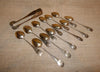 12 petites cuillères et pince à sucre anciennes en argent massif