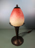 Lampe en fer forgé tulipe pâte de verre. Signé Schneider