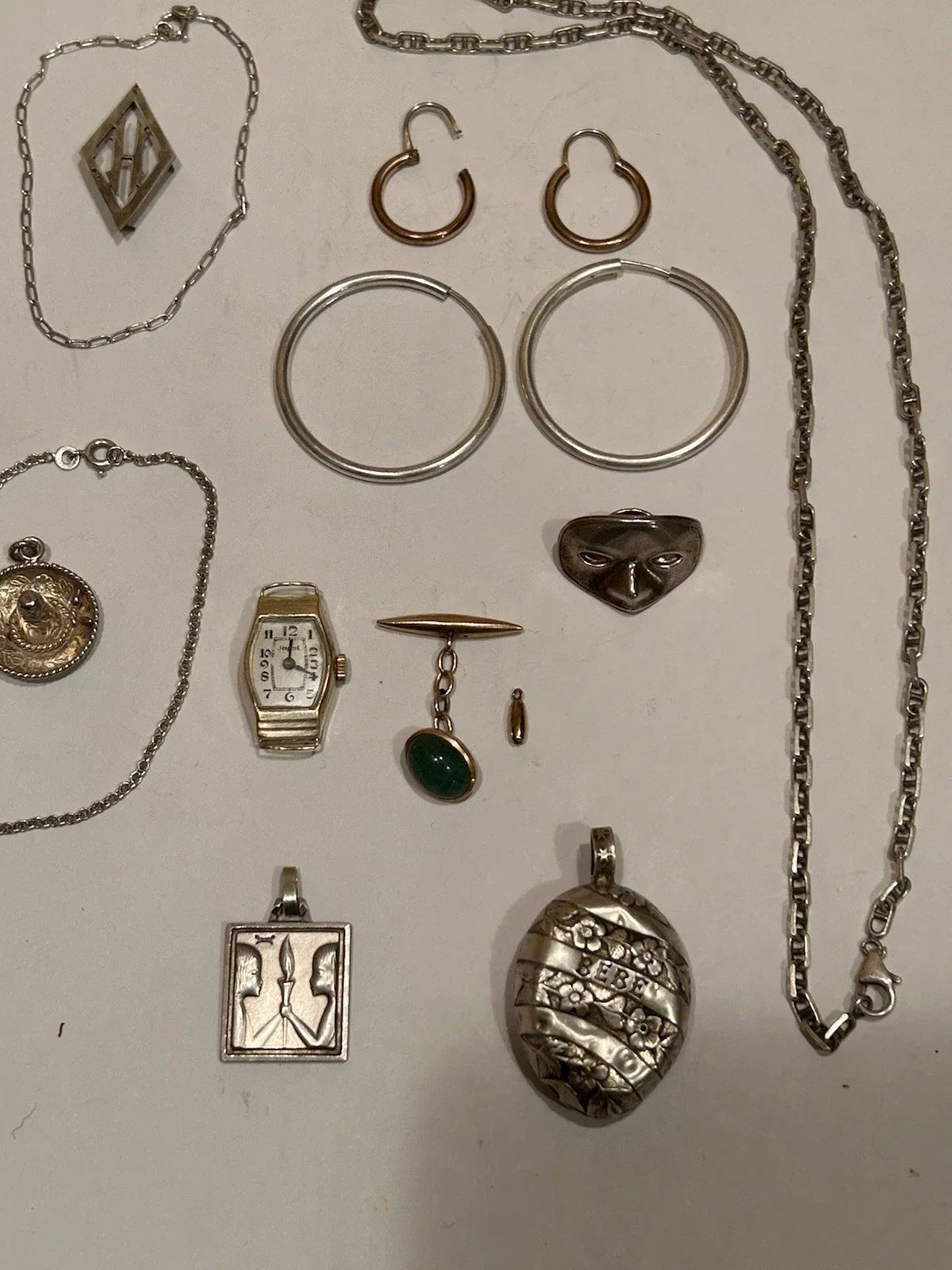 Lots de bijoux anciens en or 18 k et argent massif