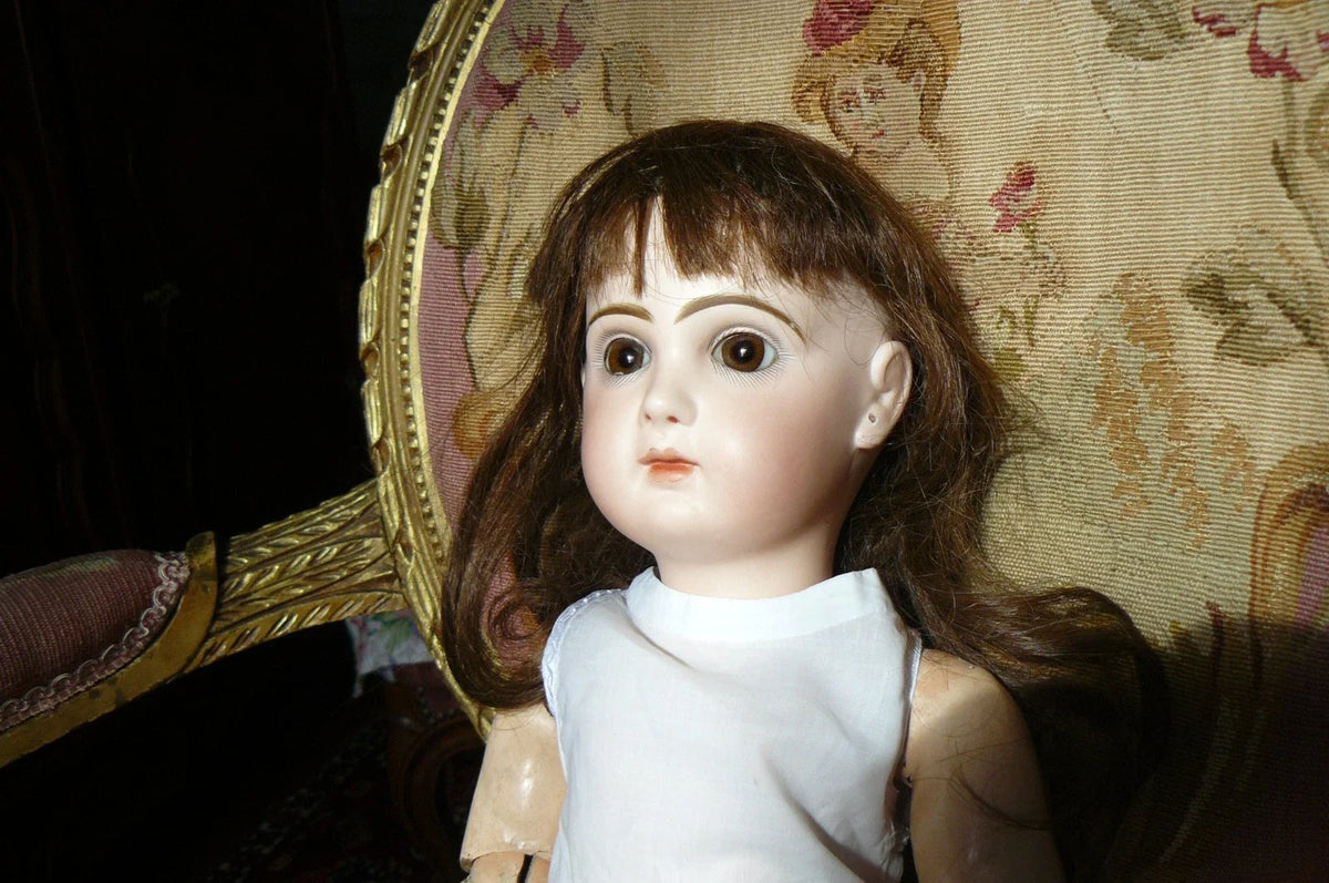 Poupée jumeau taille 9