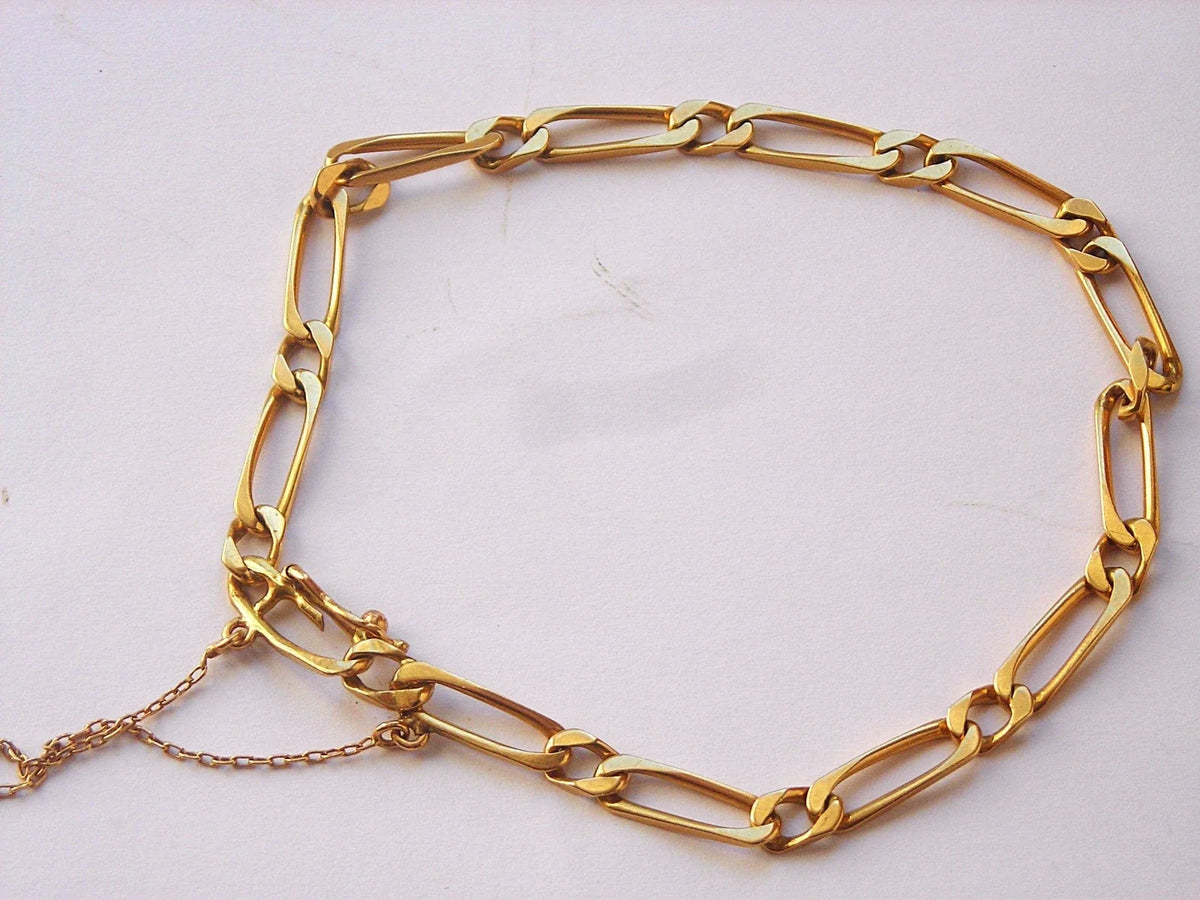 Belle gourmette en or 18 k