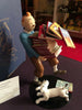 Tintin tenant les albums pixi fariboles moulinsart leblon