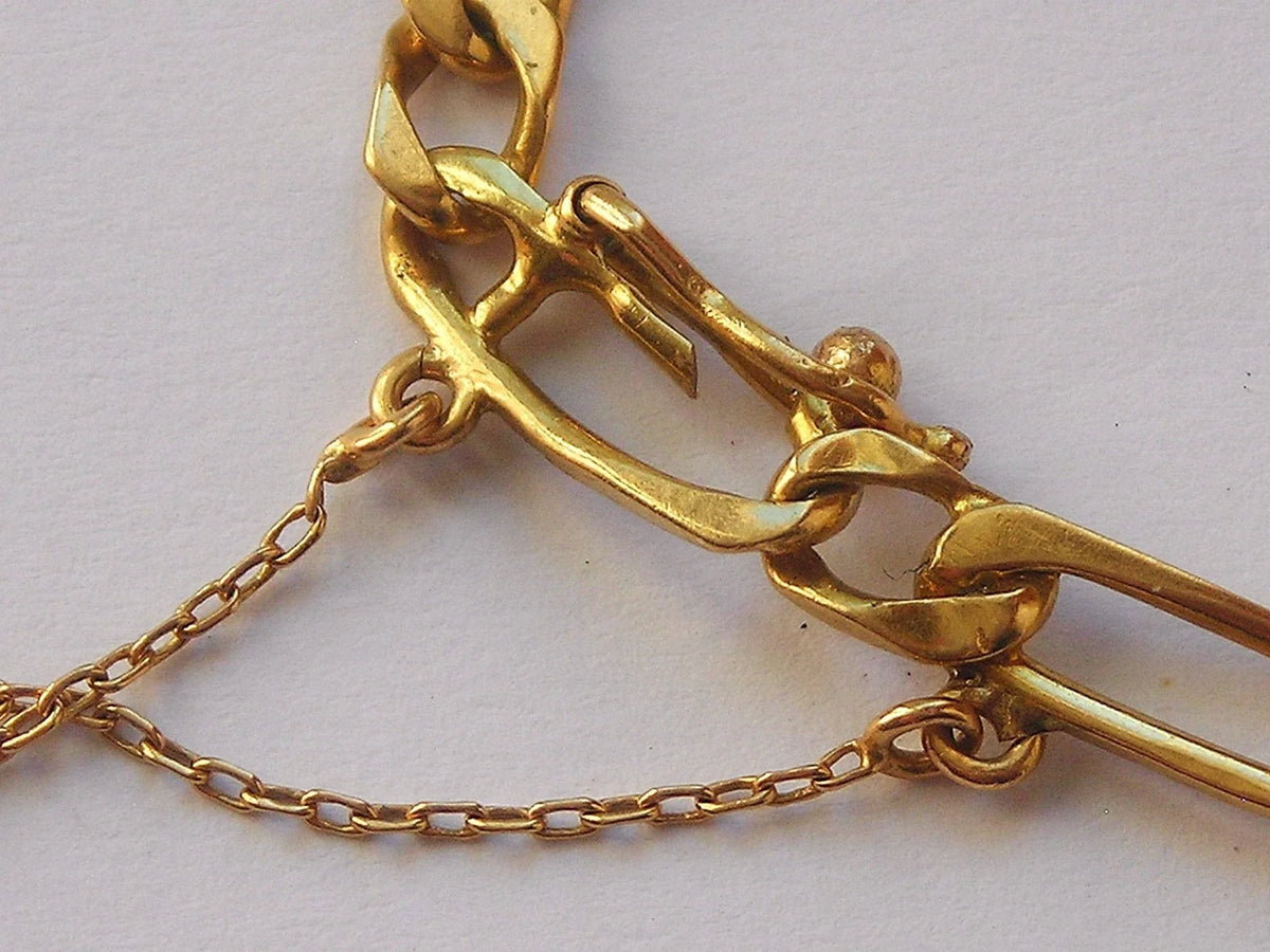 Belle gourmette en or 18 k