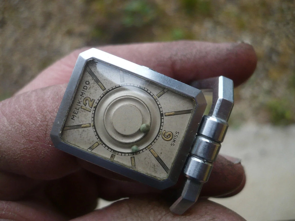 Montre Mystérieuse ancienne mécanique MELIK-MIDO