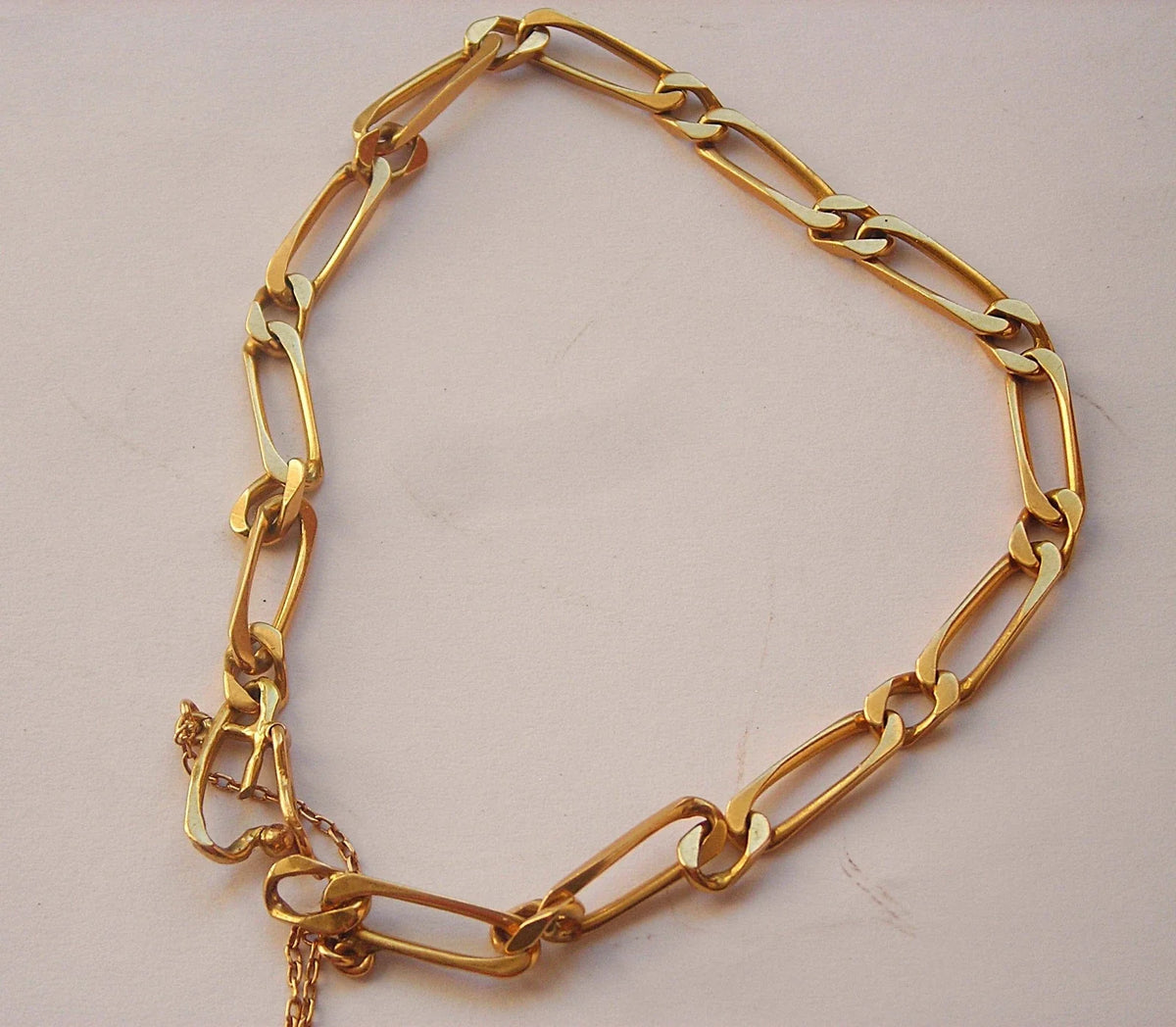 Belle gourmette en or 18 k