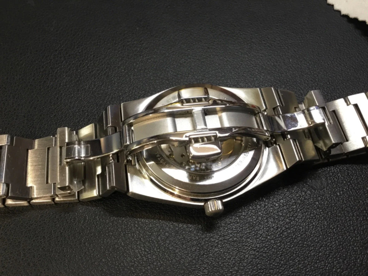 Montre Tissot PRX Powermatic 80 automatique cadran bleu Tiffany bracelet acier