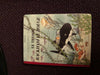 Tintin tenant les albums pixi fariboles moulinsart leblon