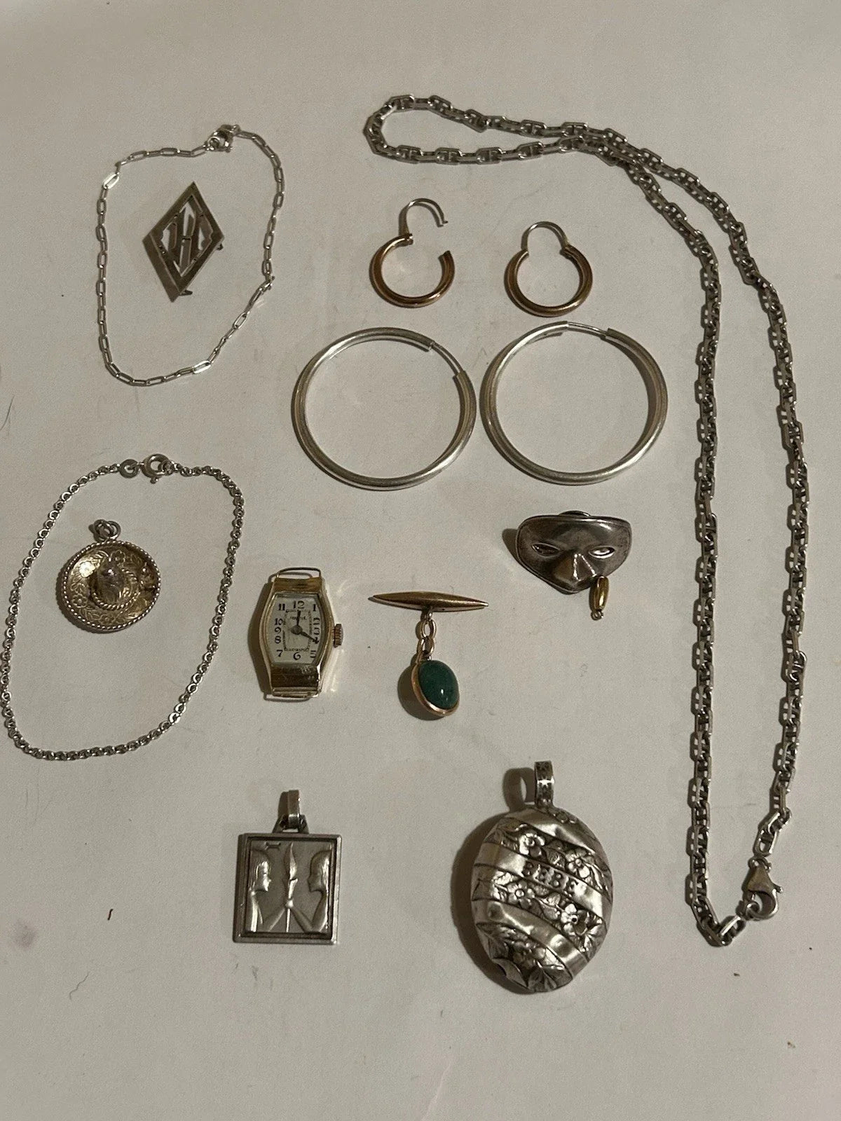 Lots de bijoux anciens en or 18 k et argent massif