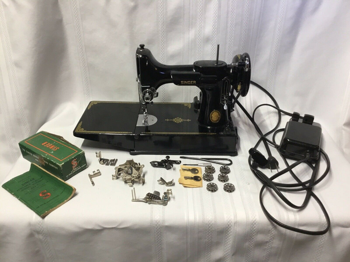 Machine à coudre poids plume vintage singer 221