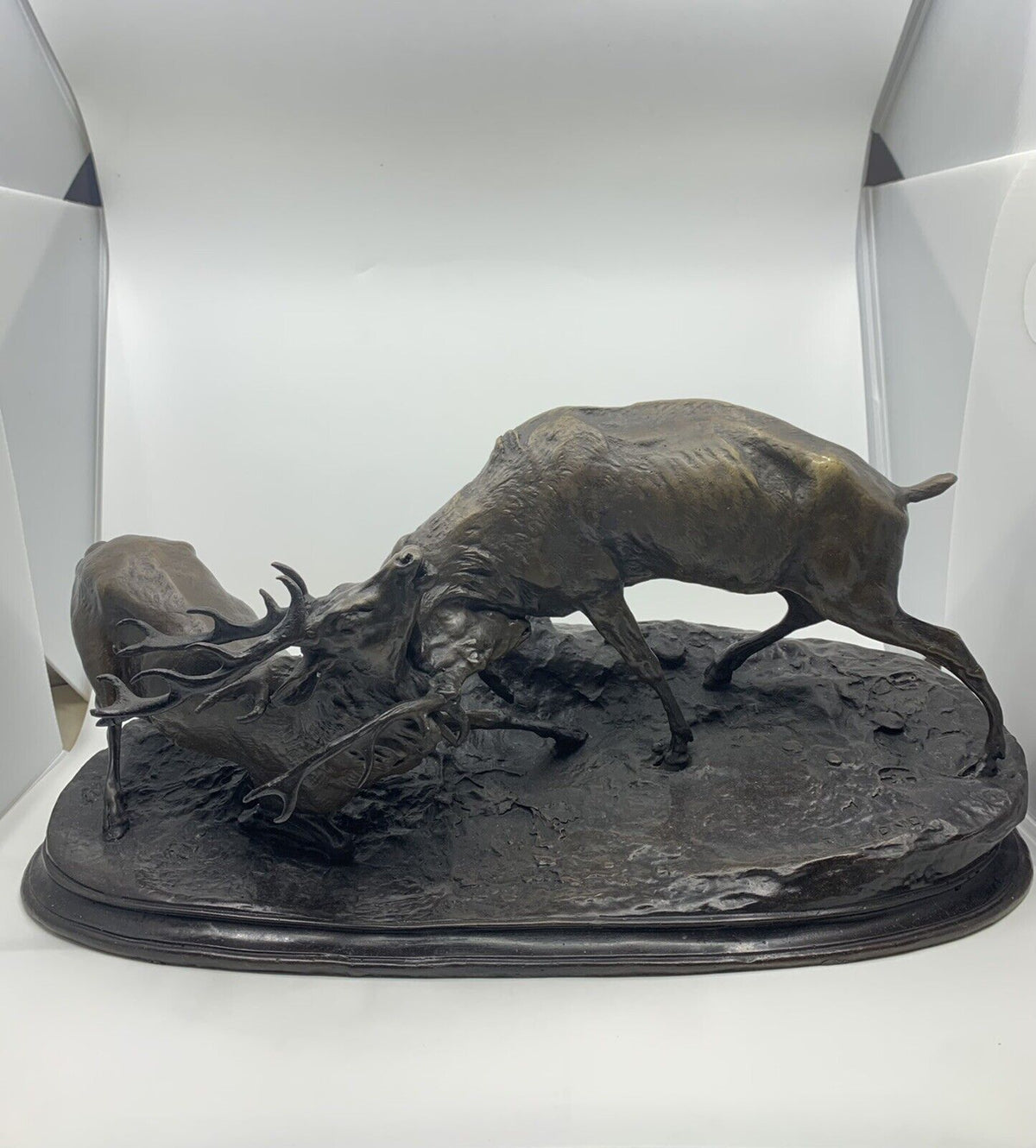 Sculpture en bronze combat de cerfs