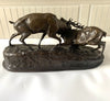 Sculpture en bronze combat de cerfs