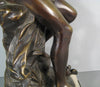 Sculpture en bronze joueur de flute
