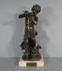 Sculpture en bronze joueur de flute