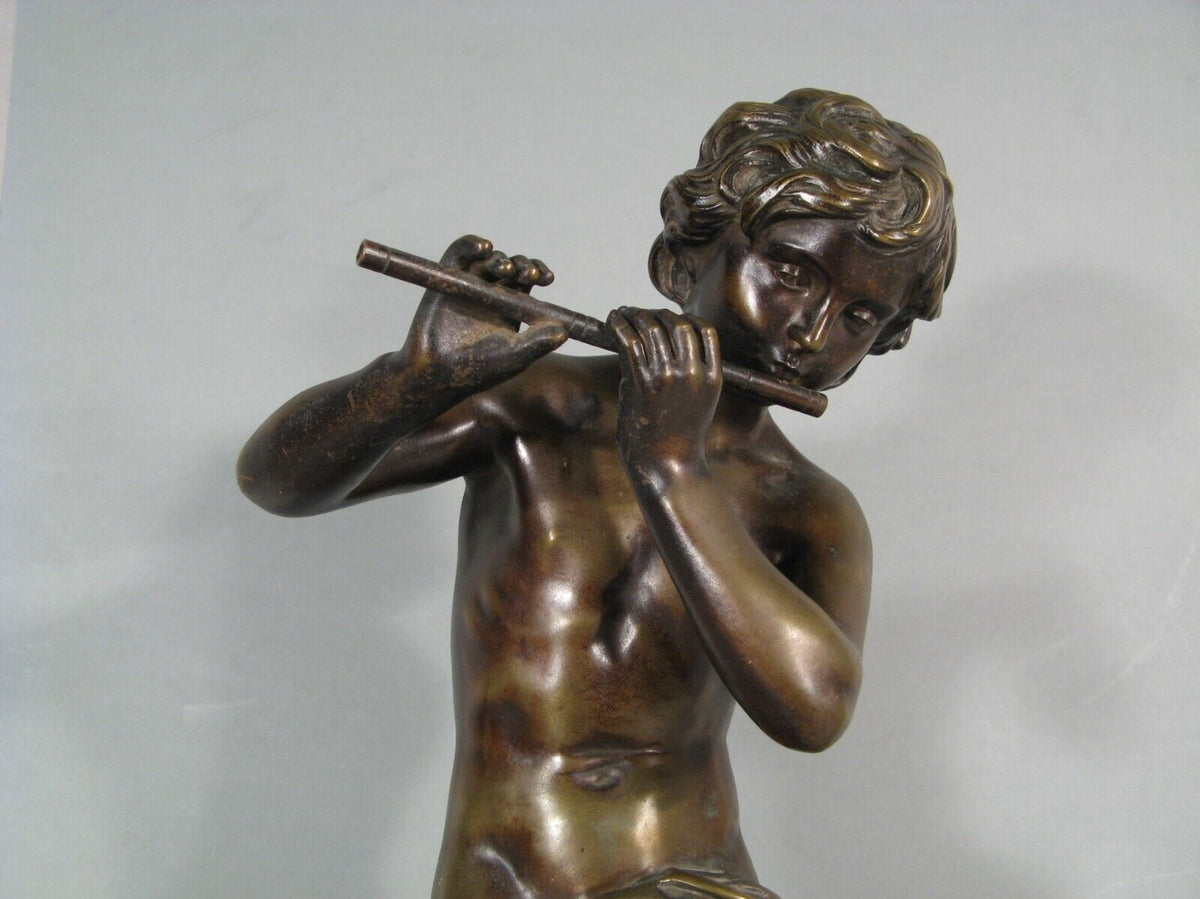 Sculpture en bronze joueur de flute