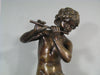 Sculpture en bronze joueur de flute