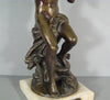 Sculpture en bronze joueur de flute