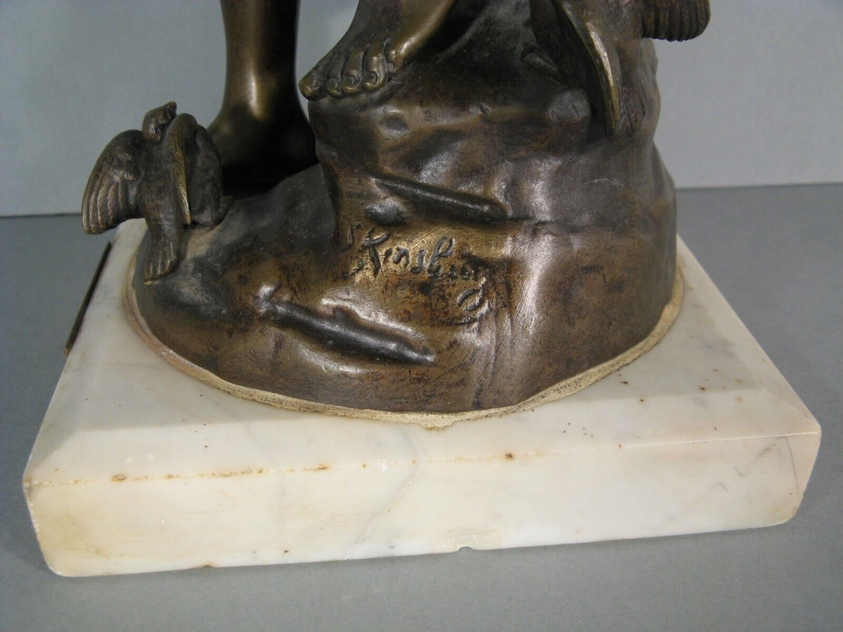 Sculpture en bronze joueur de flute