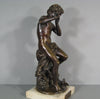 Sculpture en bronze joueur de flute