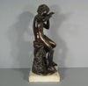 Sculpture en bronze joueur de flute