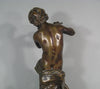 Sculpture en bronze joueur de flute
