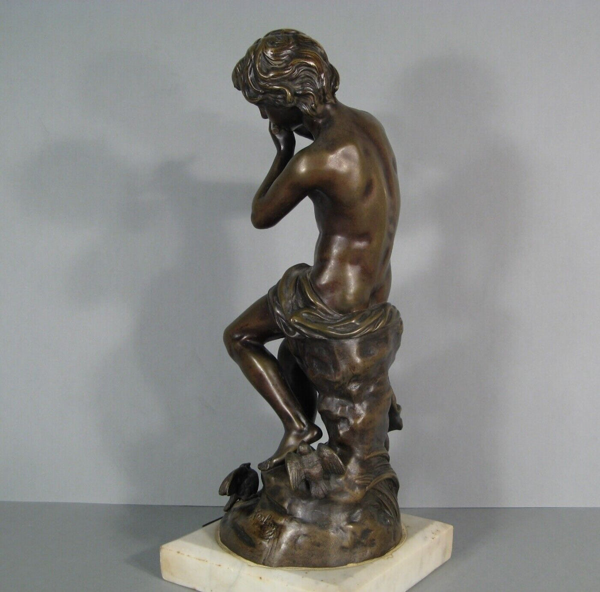 Sculpture en bronze joueur de flute